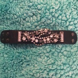 Faux black leather buckled cuff